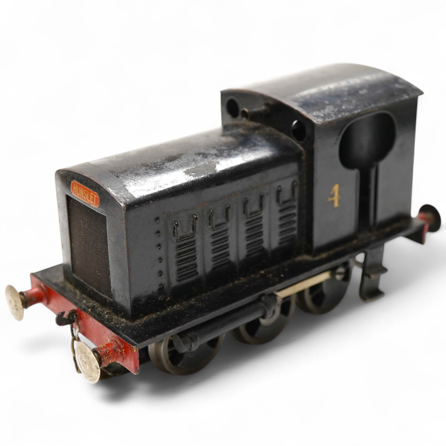 An 0 gauge railway tinplate Bonds 0-6-0 diesel Hunslet shunter, 4, for 3-rail running, with alterations to the motor and a new centre shoe adaptation